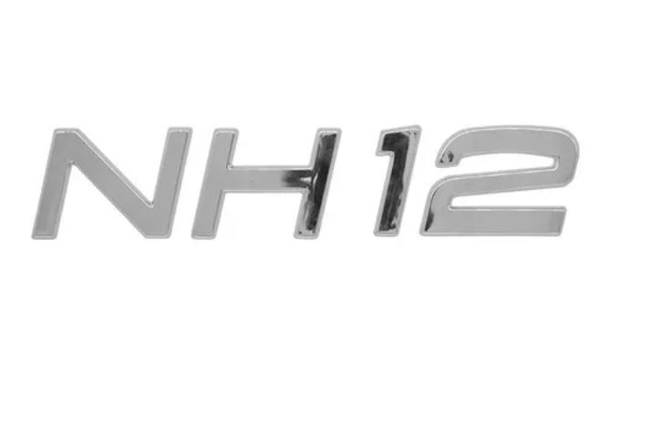 EDL038 - EMBLEMA GRADE CROMADO VOLVO NH 12