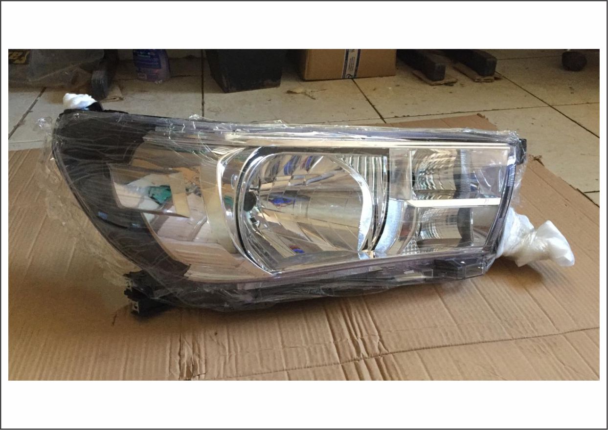 905.124 - FAROL HILUX SRV 16 LD