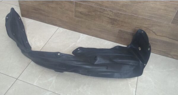905.13 - PROTETOR CAIXA RODA DIANTEIRO HILUX 2012 LD